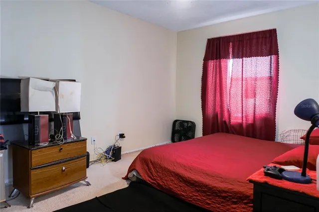a bathroom with a glass door shower a sink and a mirror