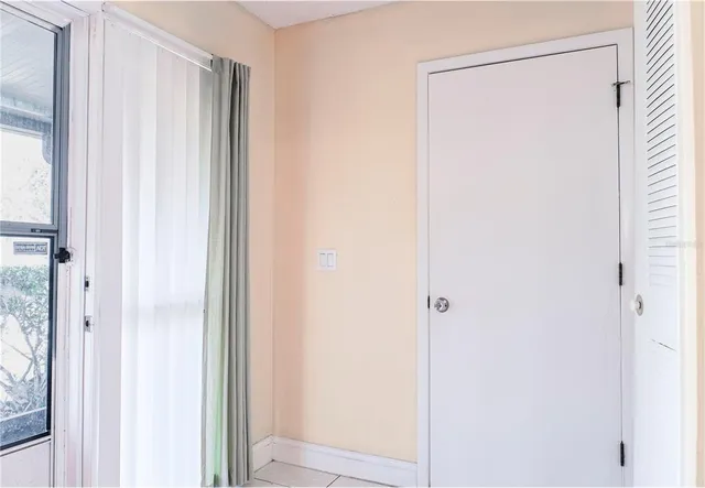 a view of a bathroom from a hallway