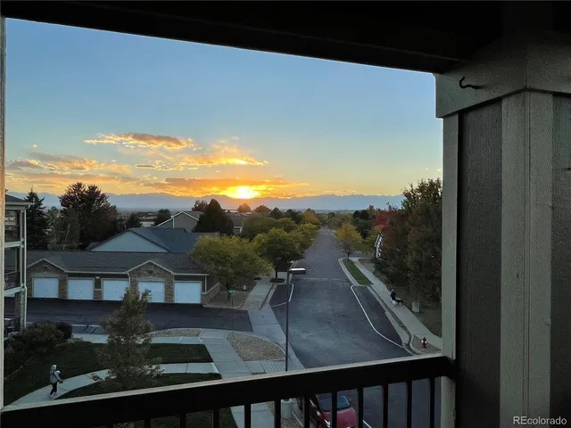 a view of a balcony with an outdoor space