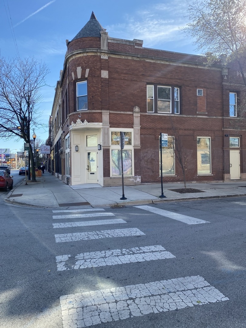 2898 North Milwaukee Avenue, Unit 2 Chicago, IL 60618 - Photo 1 of 10 a front view of a house
