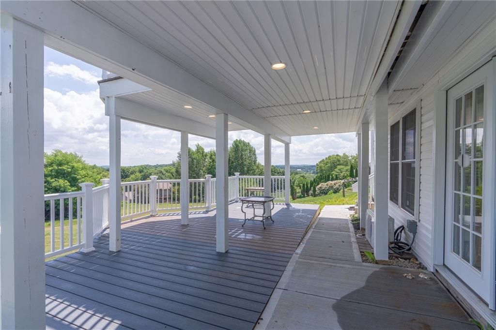 601 Slippery Rock Road Slippery Rock, PA 16057 - Photo 24 of 25 a view of a porch with wooden floor