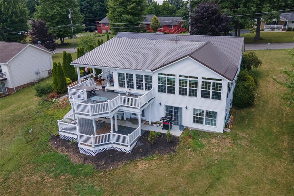 601 Slippery Rock Road Slippery Rock, PA 16057 - Photo 25 of 25 a aerial view of a house with a yard and sitting area