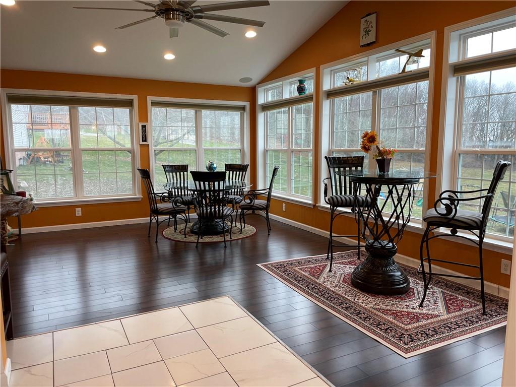601 Slippery Rock Road Slippery Rock, PA 16057 - Photo 6 of 25 a living room with hard wood floor and a floor to ceiling window