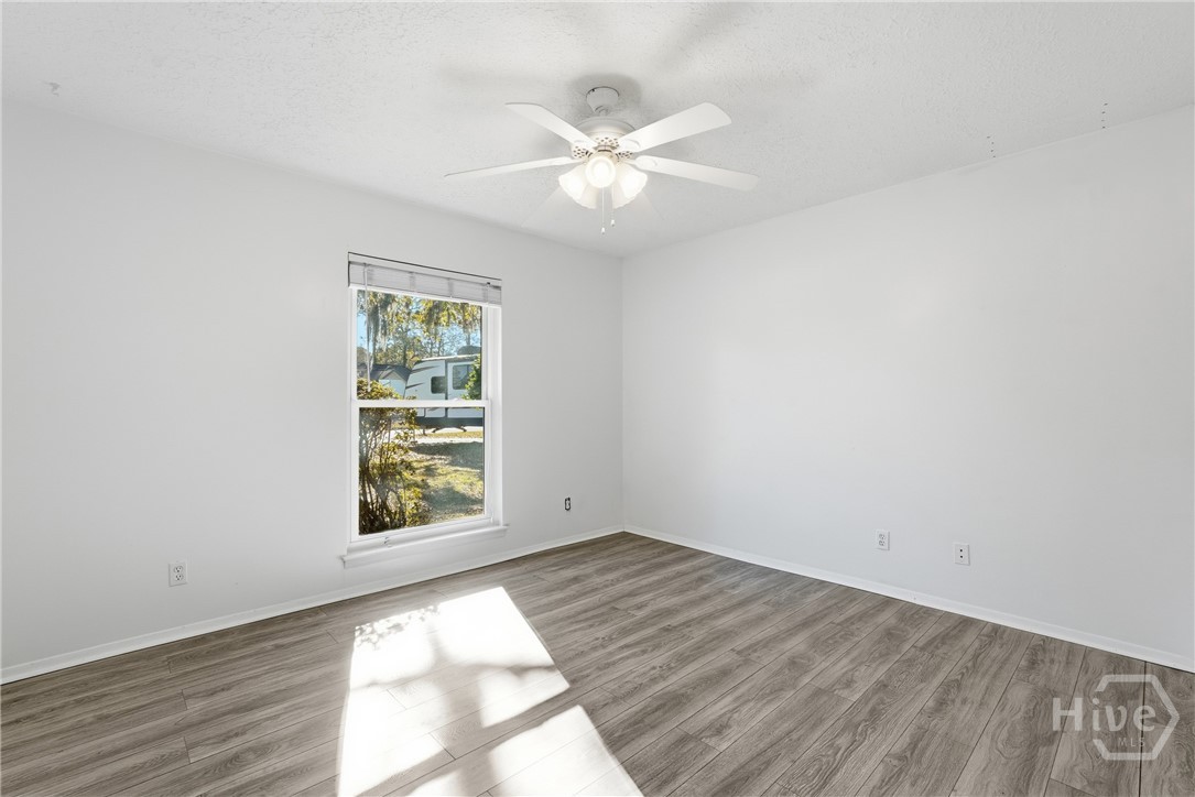 17 Cuttysark Road Savannah, GA 31410 - Photo 19 of 31 Vinyl plank flooring in one bedroom