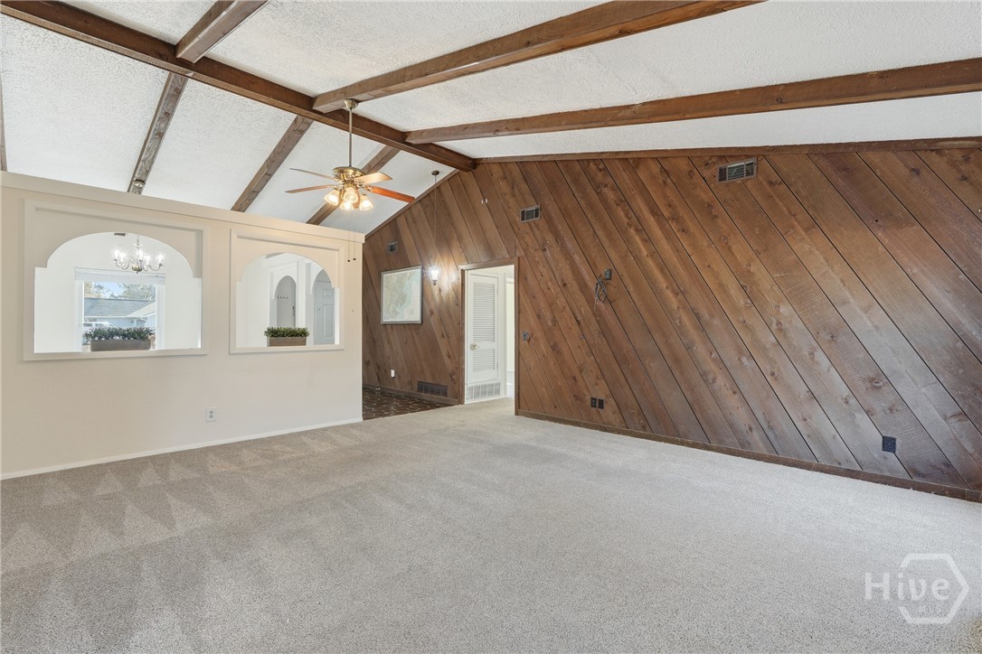 17 Cuttysark Road Savannah, GA 31410 - Photo 3 of 31 Wood panel wall