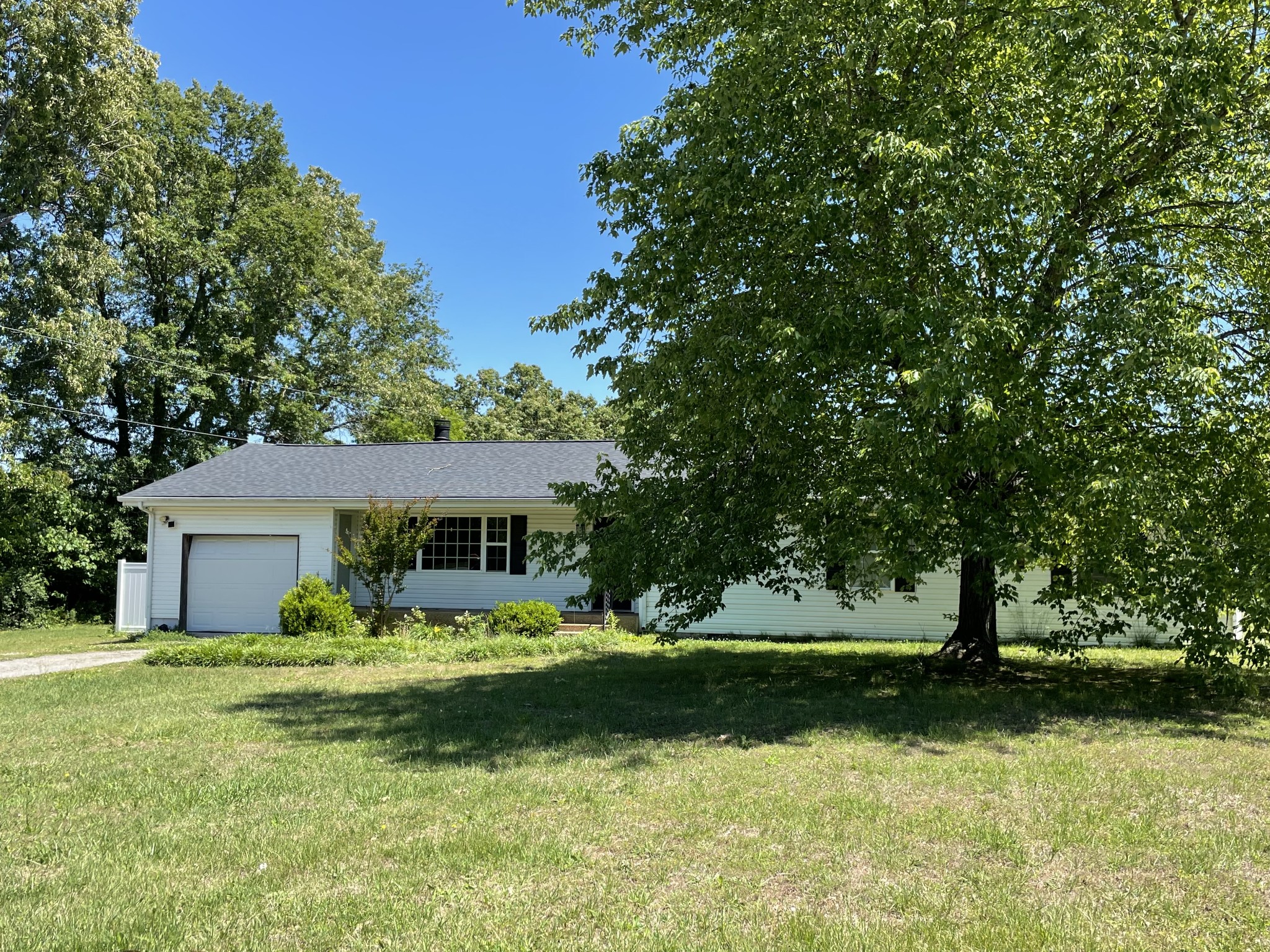 305 Cedar Hill Road Adams, TN 37010 - Photo 2 of 34 a front view of house with yard and green space