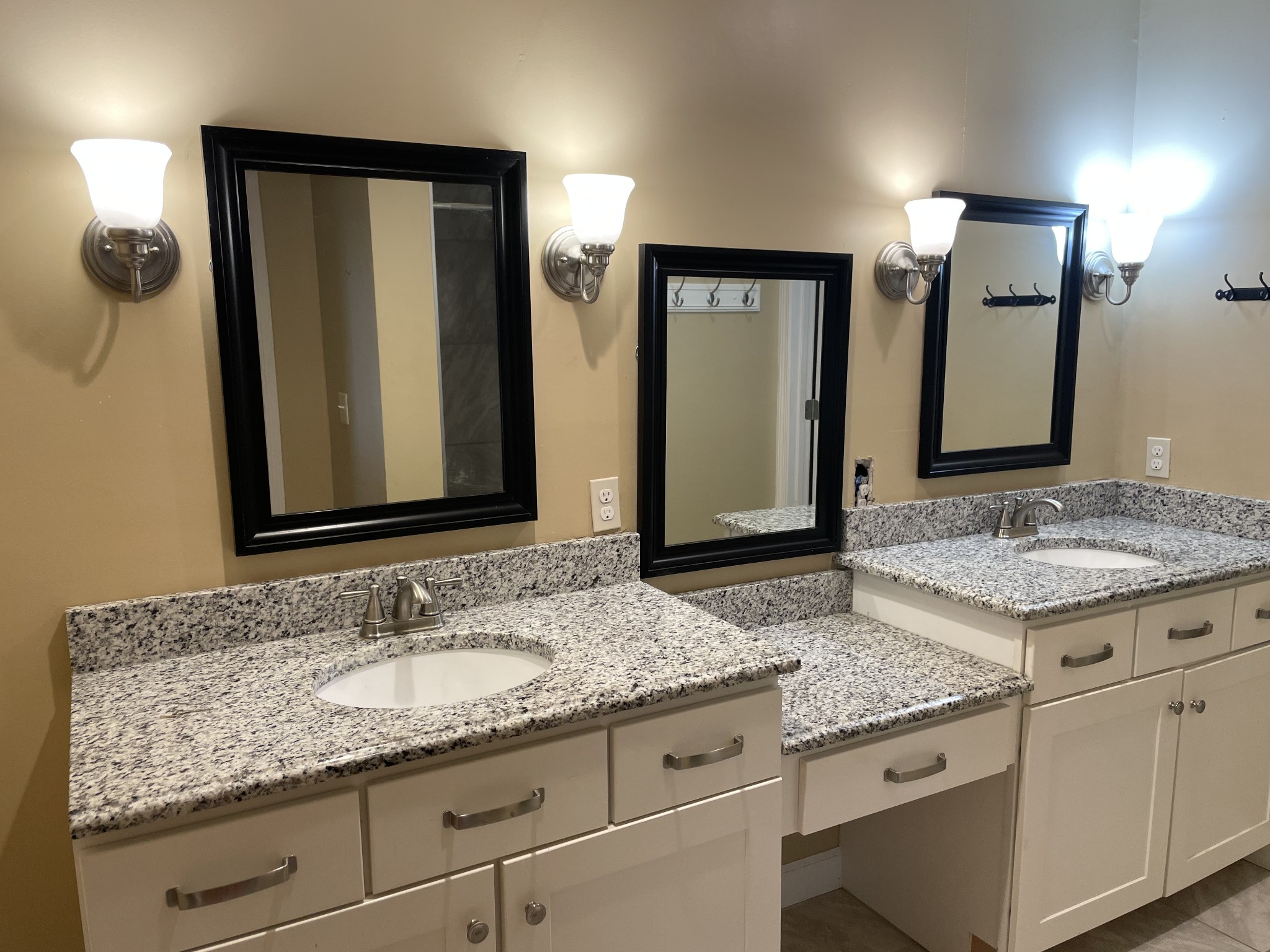 305 Cedar Hill Road Adams, TN 37010 - Photo 25 of 34 a bathroom with a granite countertop sink and a mirror