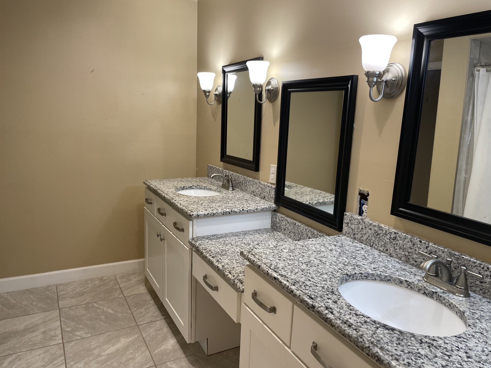 305 Cedar Hill Road Adams, TN 37010 - Photo 26 of 34 a bathroom with a granite countertop sink and a mirror