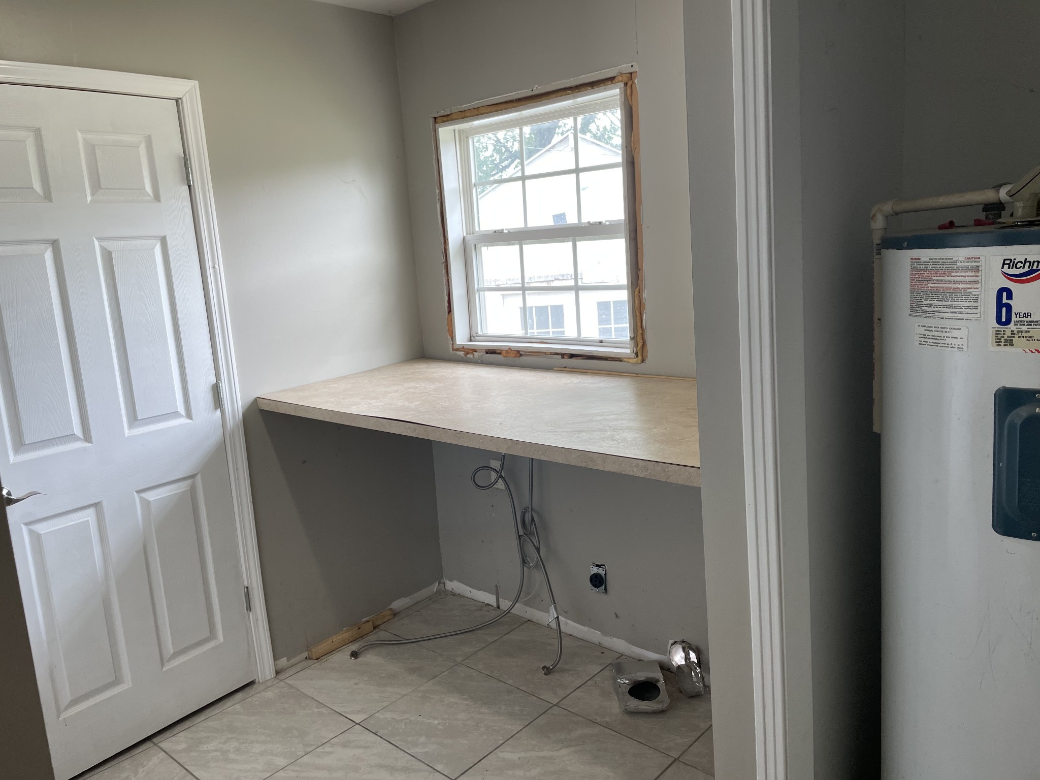 305 Cedar Hill Road Adams, TN 37010 - Photo 34 of 34 a bathroom with a sink and a mirror