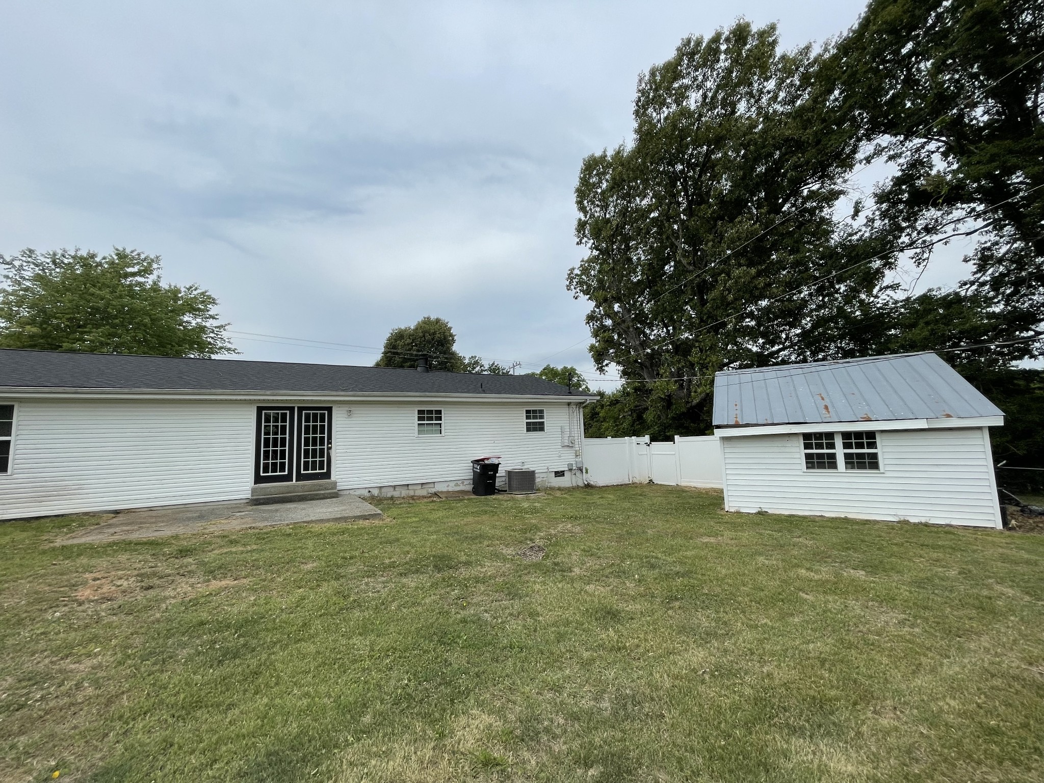 305 Cedar Hill Road Adams, TN 37010 - Photo 6 of 34 front view of a house with a yard