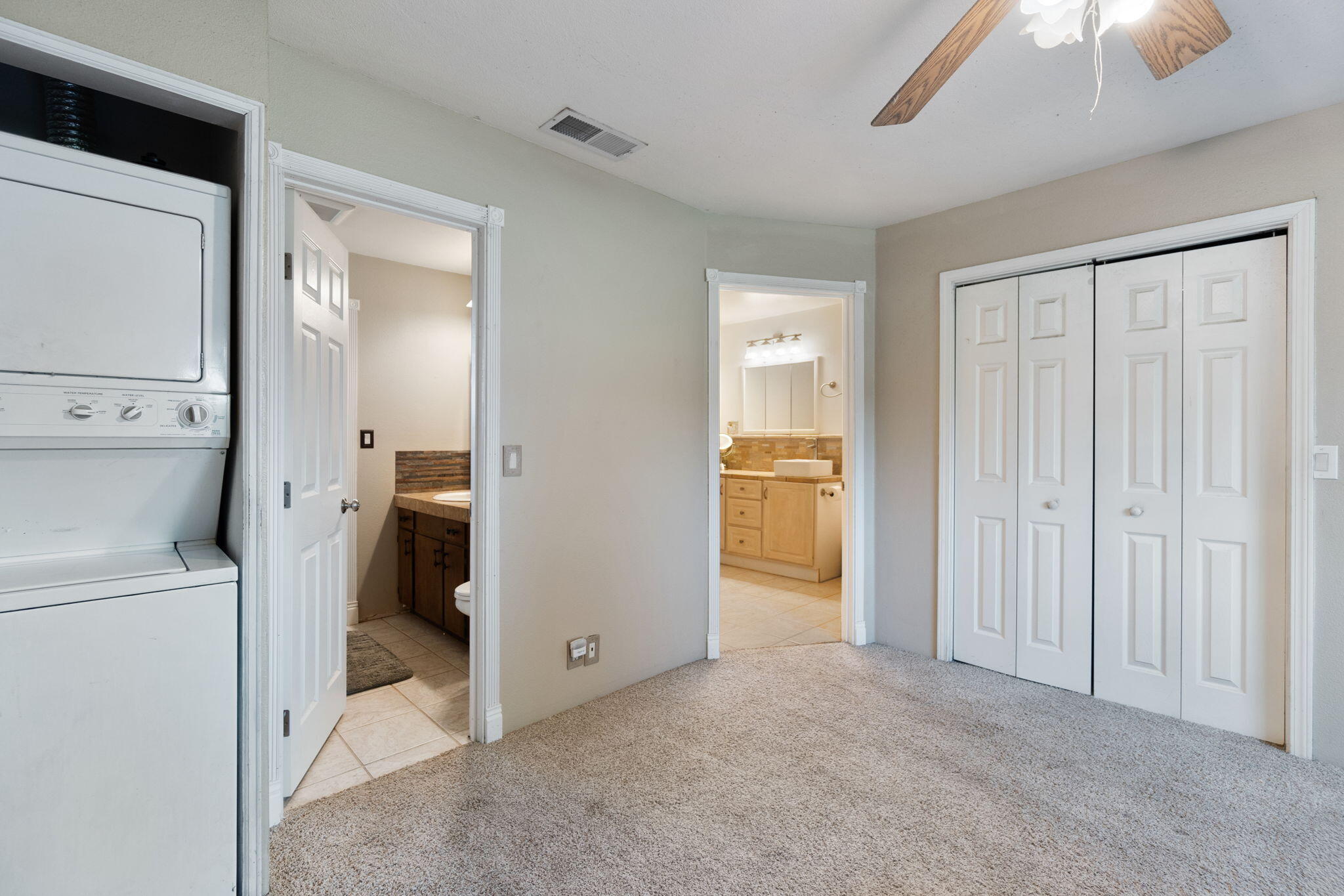 20831 Clough Creek Road Redding, CA 96002 - Photo 93 of 107 ADU Closet & washer/dryer