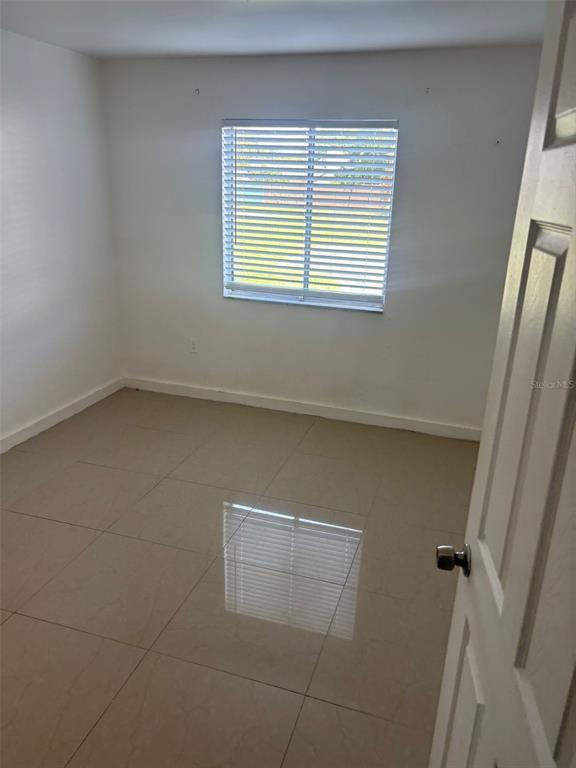 13300 Walsingham Road, Unit 61 Largo, FL 33774 - Photo 7 of 18 a view of a small space with window