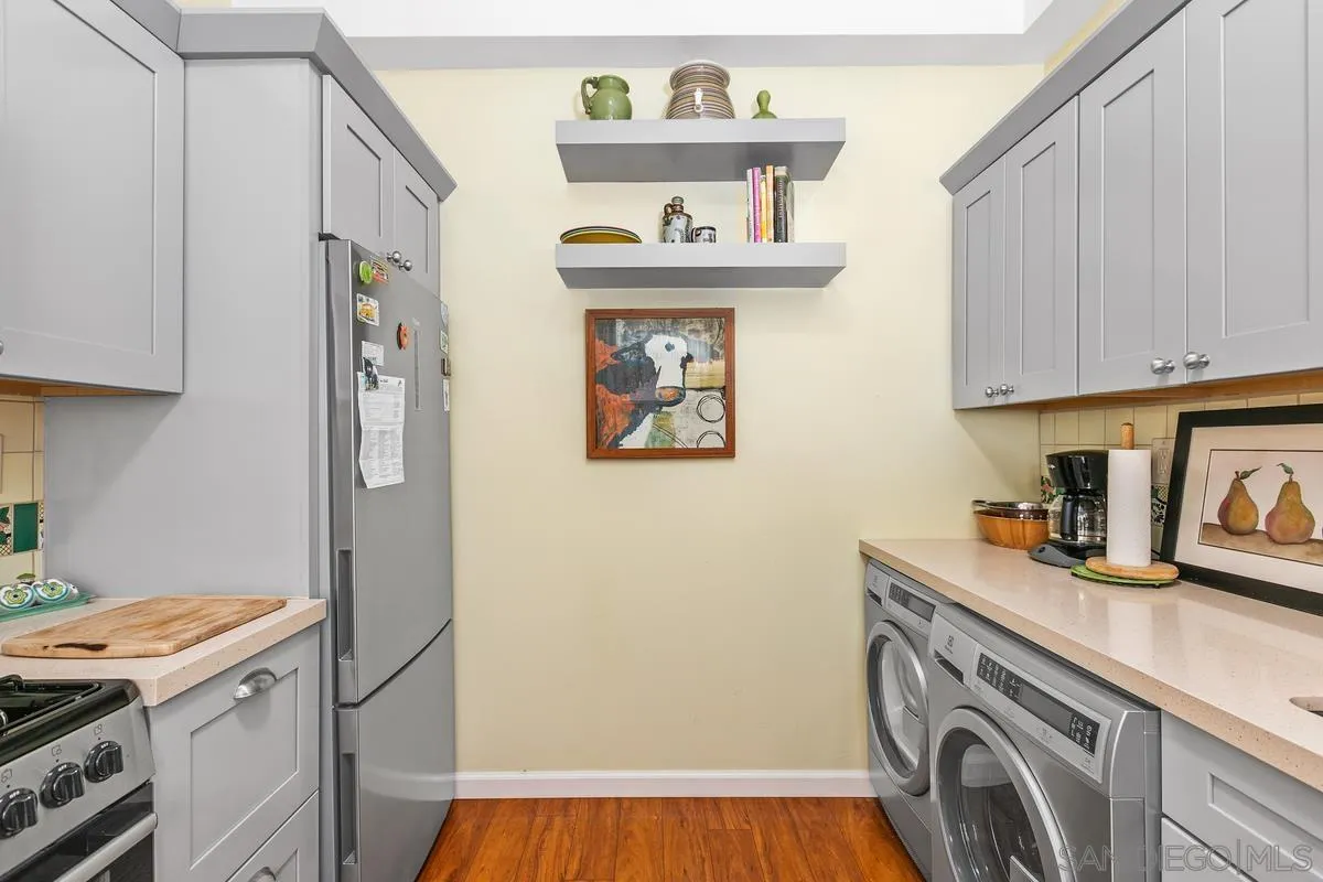 751 G Avenue Coronado, CA 92118 - Photo 11 of 23 a utility room with dryer and washer