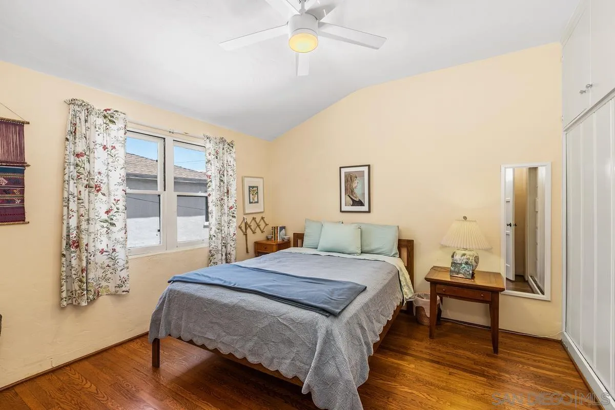 751 G Avenue Coronado, CA 92118 - Photo 15 of 23 a bedroom with a bed and a window