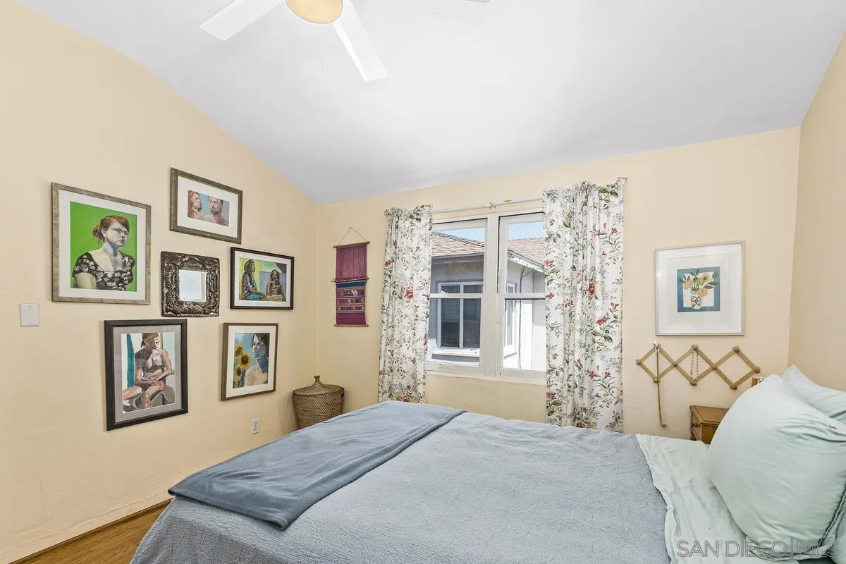 751 G Avenue Coronado, CA 92118 - Photo 16 of 23 a bedroom with a bed and a couch