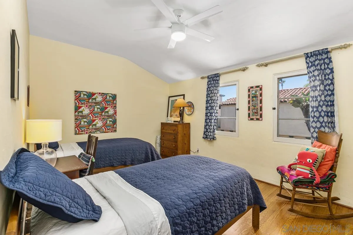 751 G Avenue Coronado, CA 92118 - Photo 20 of 23 a bedroom with two beds and a couch