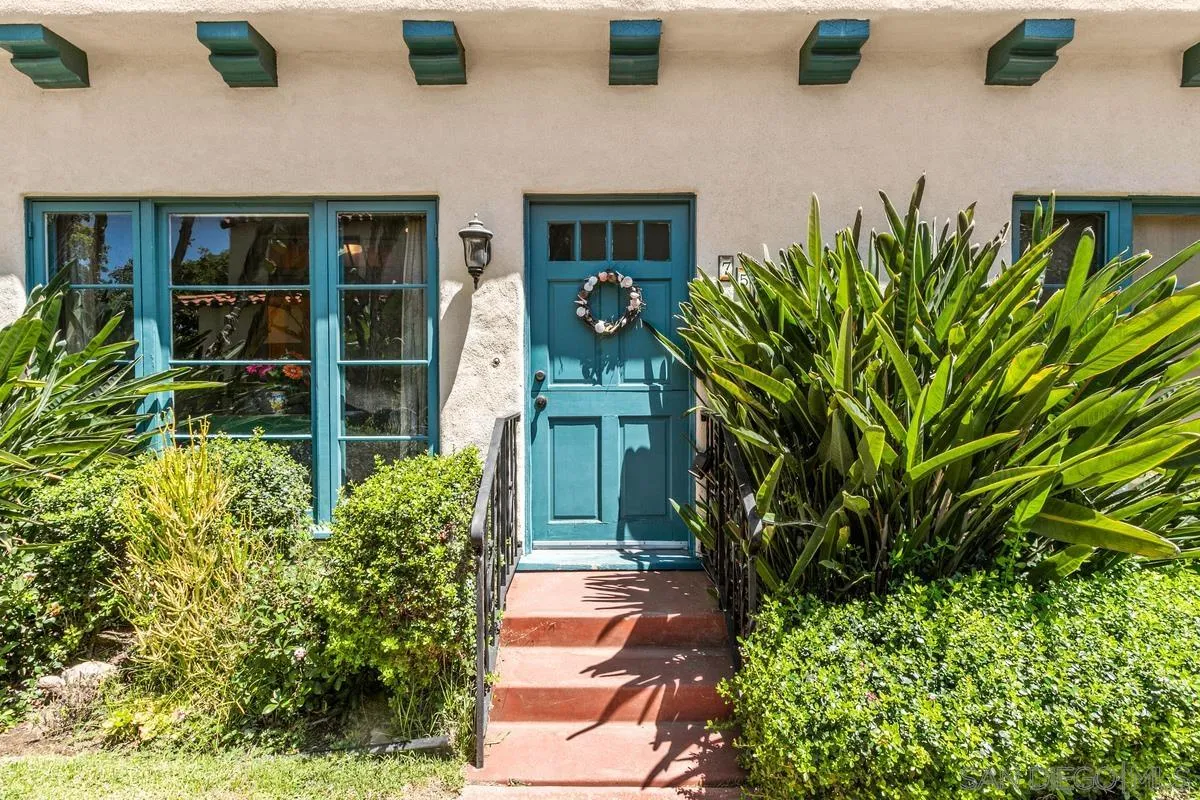 751 G Avenue Coronado, CA 92118 - Photo 2 of 23 a front view of a house with a garden