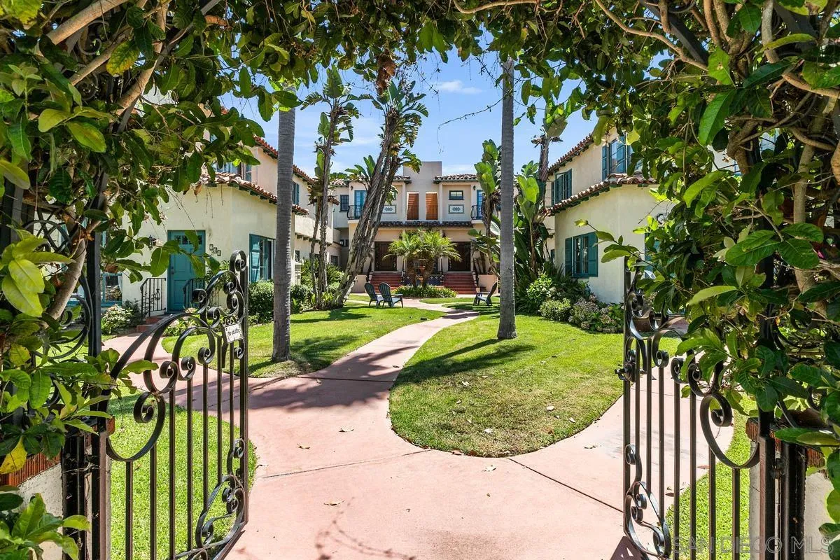 751 G Avenue Coronado, CA 92118 - Photo 22 of 23 a view of a garden with a fountain
