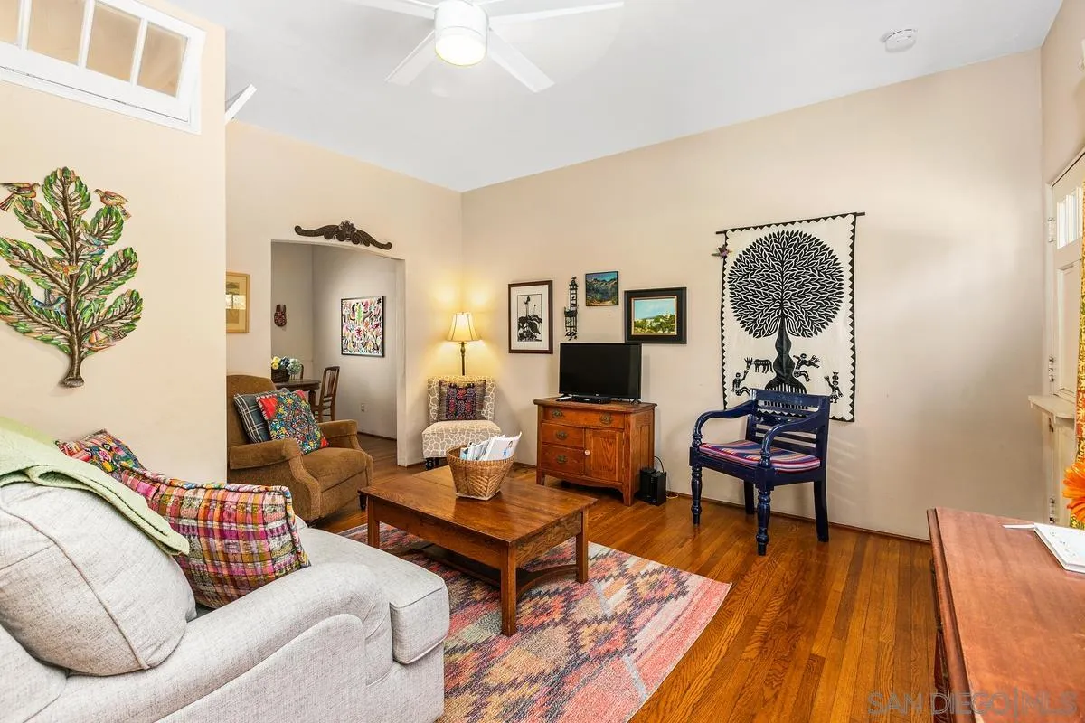 751 G Avenue Coronado, CA 92118 - Photo 4 of 23 a living room with furniture and a wooden floor