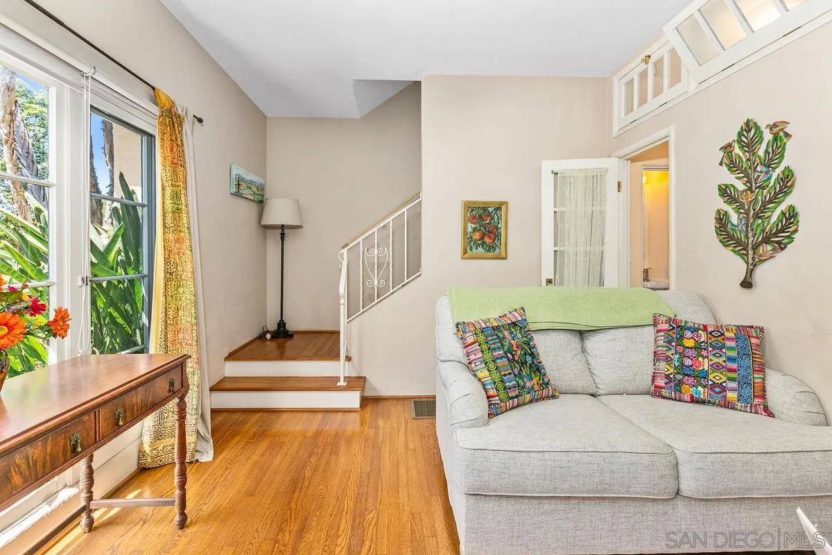 751 G Avenue Coronado, CA 92118 - Photo 5 of 23 a living room with furniture and a large window