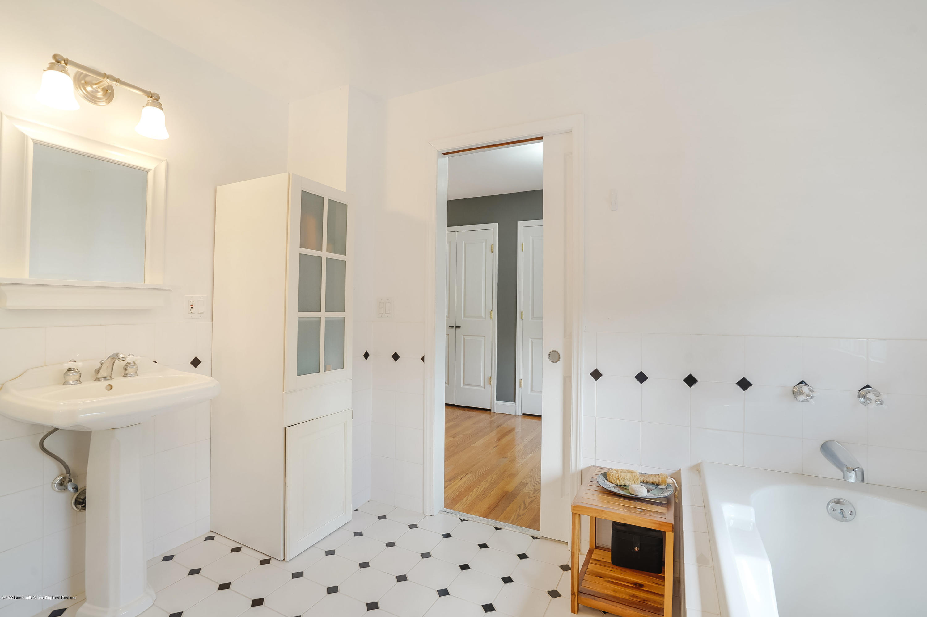 434 East Freehold Road Freehold, NJ 07728 - Photo 22 of 29 a bathroom with a sink toilet and shower