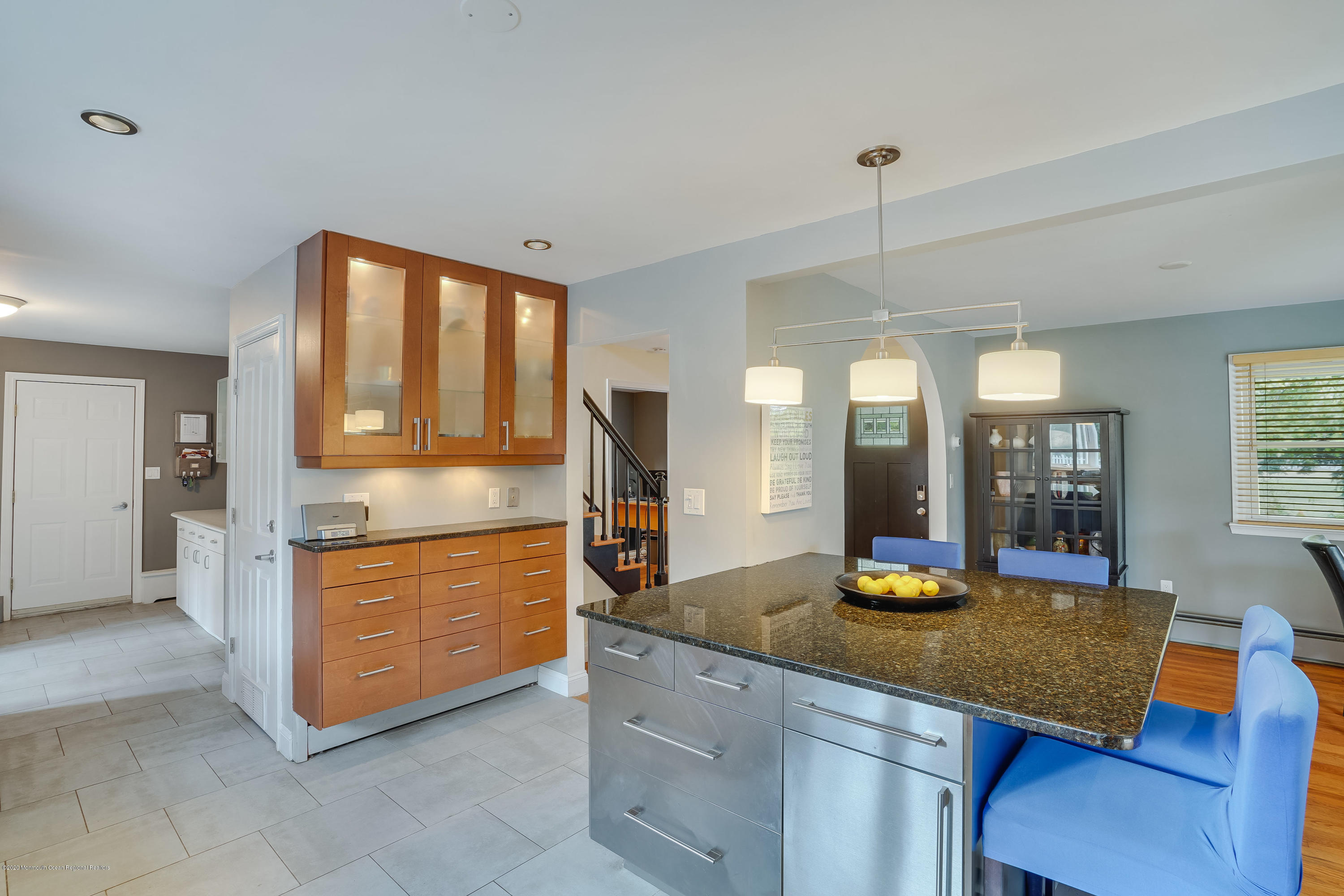 434 East Freehold Road Freehold, NJ 07728 - Photo 9 of 29 a kitchen with stainless steel appliances granite countertop a sink dishwasher and a stove with wooden floor