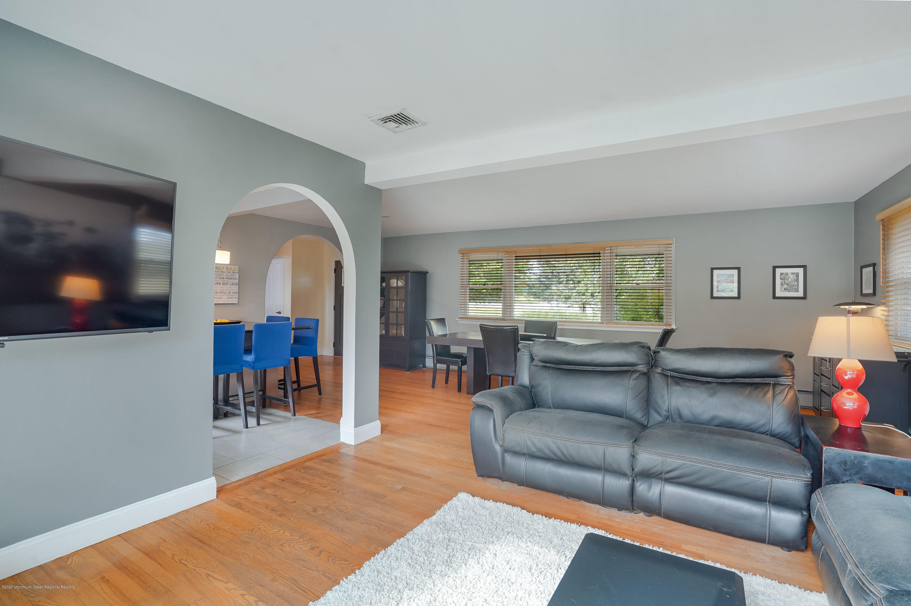 434 East Freehold Road Freehold, NJ 07728 - Photo 10 of 29 a living room with furniture and a flat screen tv
