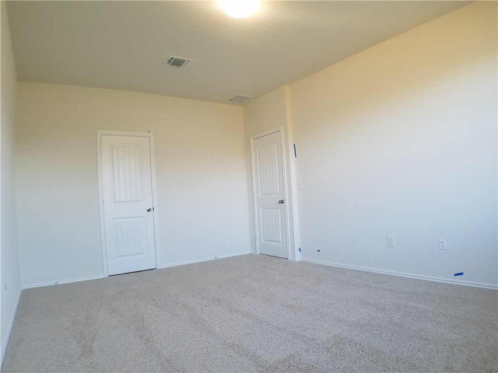 15016 Harkness Pass Austin, TX 78725 - Photo 12 of 25 a view of an empty room