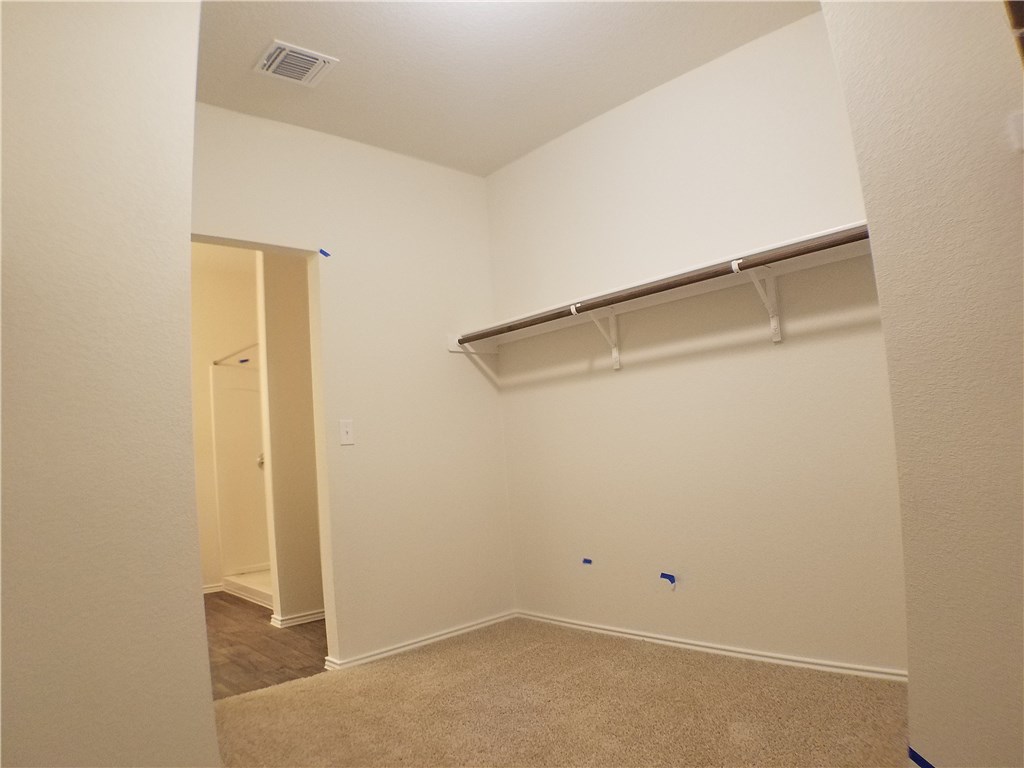 15016 Harkness Pass Austin, TX 78725 - Photo 14 of 25 an empty room
