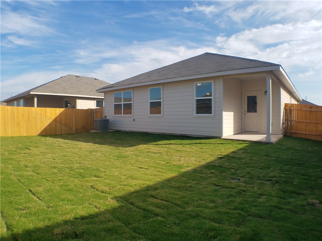 15016 Harkness Pass Austin, TX 78725 - Photo 22 of 25 a front view of house with yard