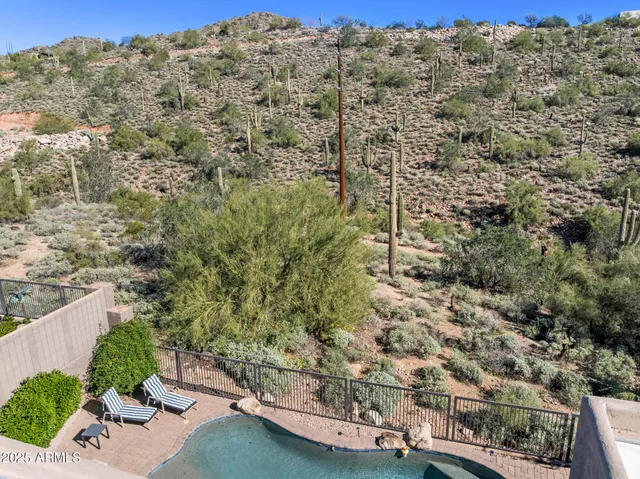 an aerial view of a house with a garden