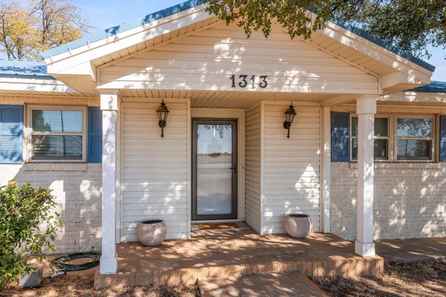 a view of a building with a street
