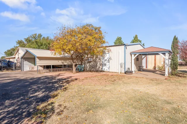 a kitchen with stainless steel appliances a refrigerator sink and cabinets