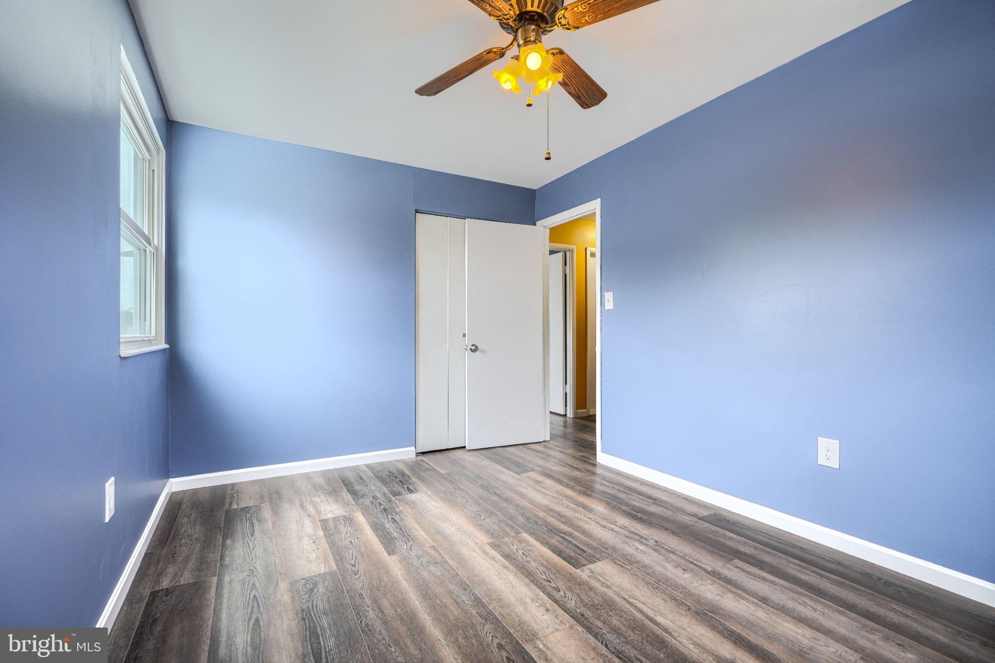 3910 Carthage Road Randallstown, MD 21133 - Photo 25 of 42 Bright and airy blue-walled room.