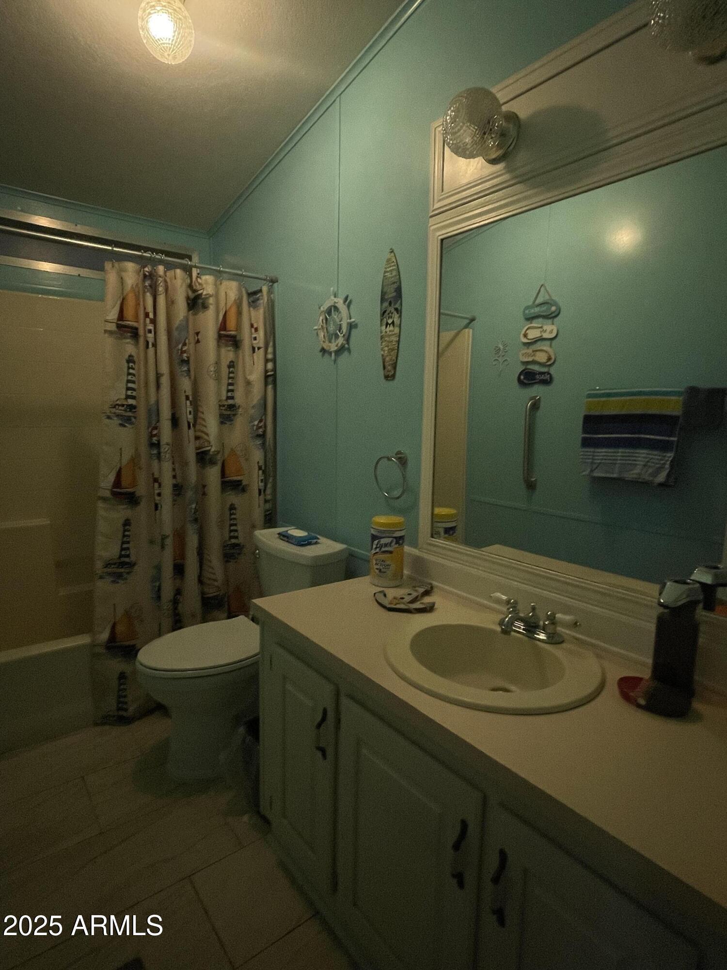 2100 North Trekell Road, Unit 254 Casa Grande, AZ 85122 - Photo 20 of 27 a bathroom with a sink a toilet and shower