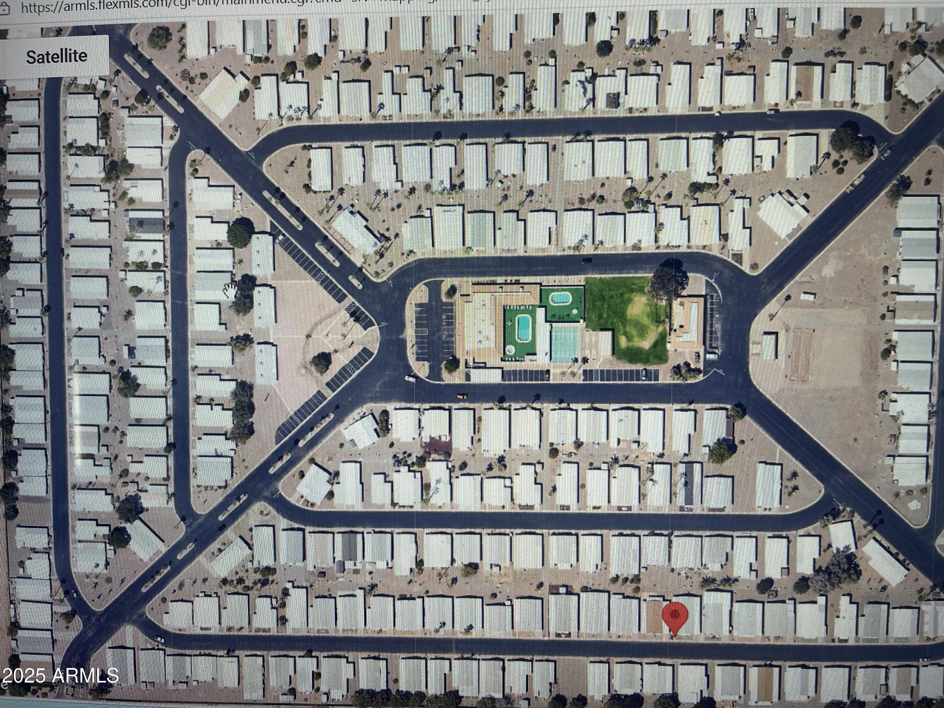 2100 North Trekell Road, Unit 254 Casa Grande, AZ 85122 - Photo 27 of 27 a view of staircase with lots of frames on wall and a window