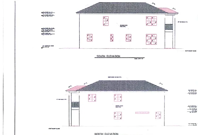a living room with couch and outdoor view