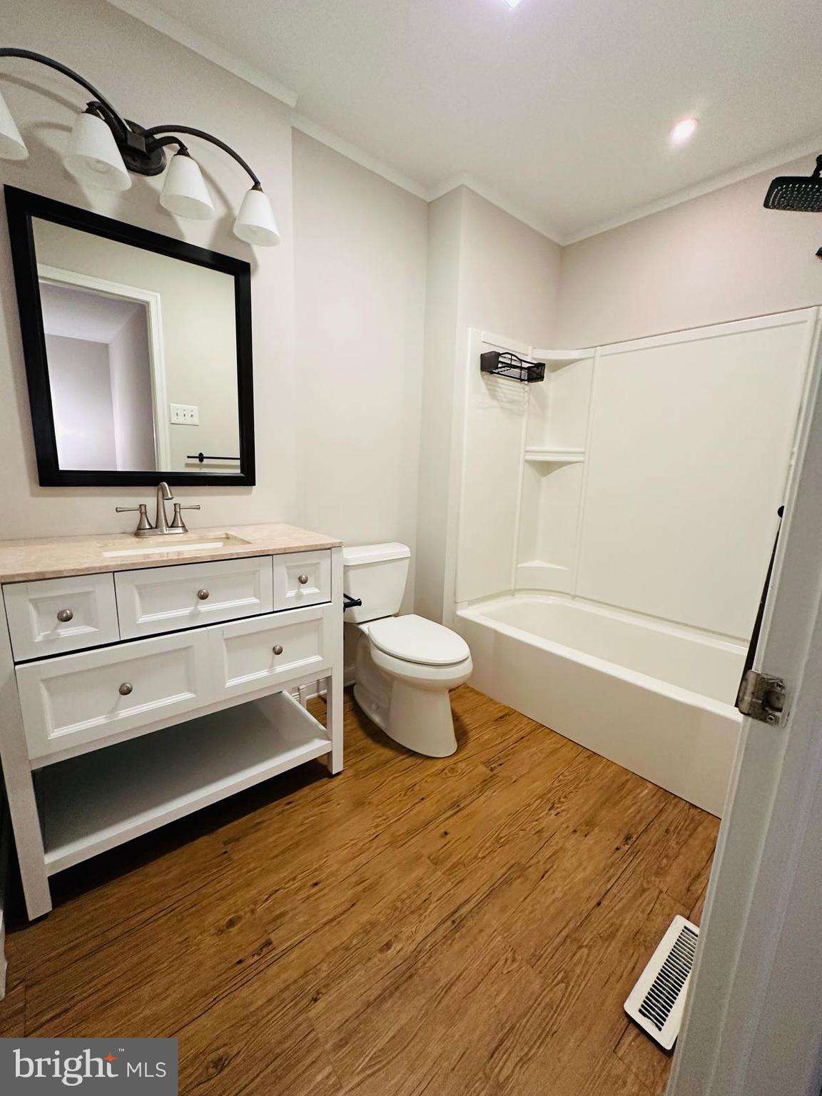 33 Trowbridge Lane Clementon, NJ 08021 - Photo 12 of 20 a bathroom with a toilet sink and mirror