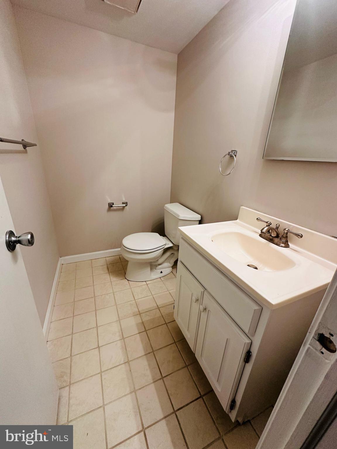 33 Trowbridge Lane Clementon, NJ 08021 - Photo 15 of 20 a bathroom with a sink a toilet and a mirror