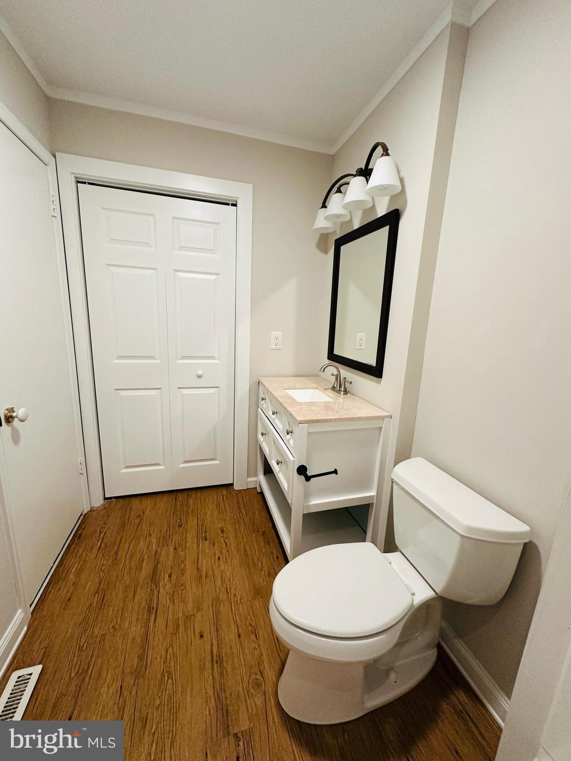 33 Trowbridge Lane Clementon, NJ 08021 - Photo 16 of 20 a white toilet sitting next to a bathroom sink