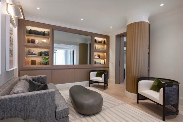 a living room with furniture and a couch