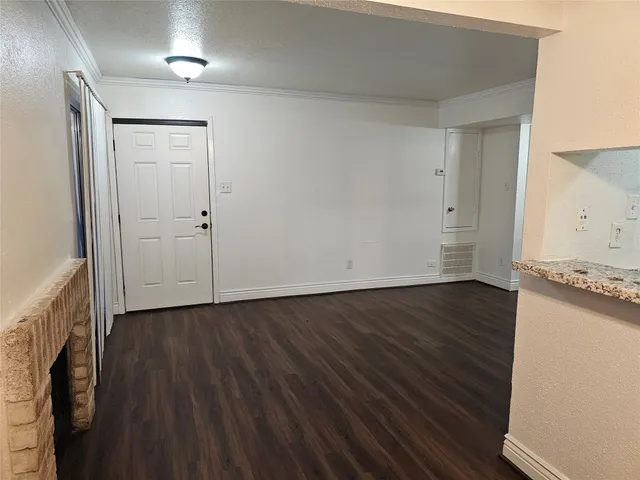 a view of a storage & utility room with wooden floor