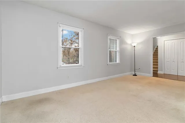 an empty room with windows