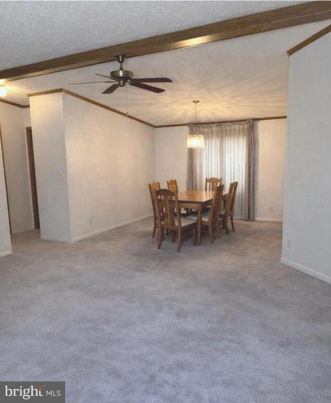148 1st Street Lothian, MD 20711 - Photo 12 of 29 a view of a livingroom with furniture and chandelier
