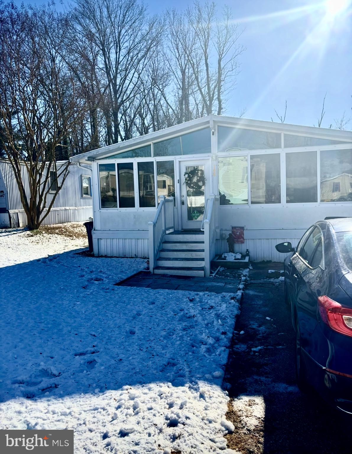 148 1st Street Lothian, MD 20711 - Photo 2 of 29 a front view of a house with a yard