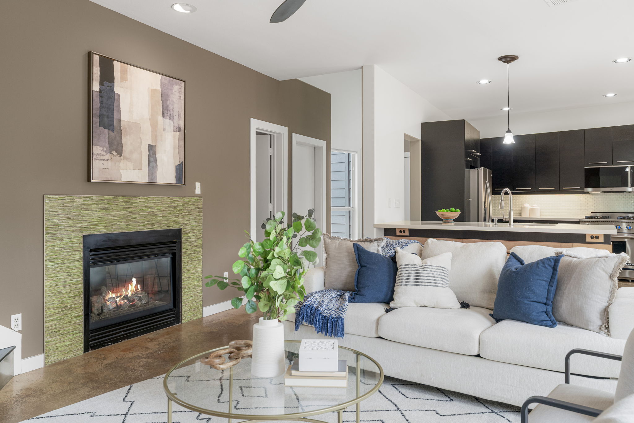 2114 Goodrich Avenue, Unit 10 Austin, TX 78704 - Photo 12 of 35 The airy layout creates a welcoming gathering space where indoor comfort meets outdoor connection.