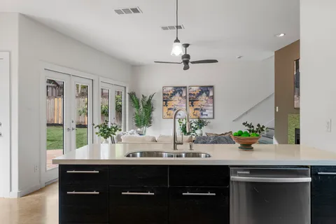 a kitchen with a sink and a window