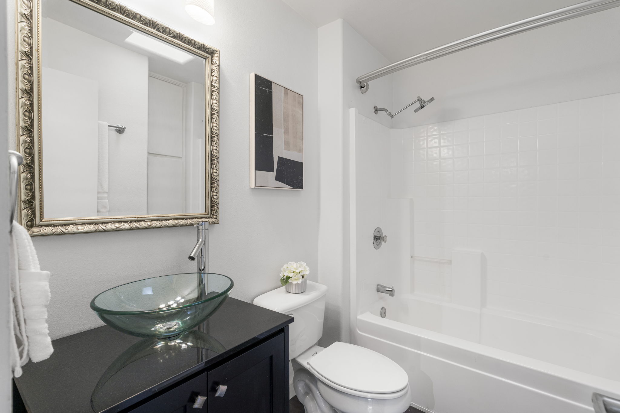 2114 Goodrich Avenue, Unit 10 Austin, TX 78704 - Photo 24 of 35 An additional full bath features clean finishes and a thoughtful layout for guests, conveniently within the other bedroom.