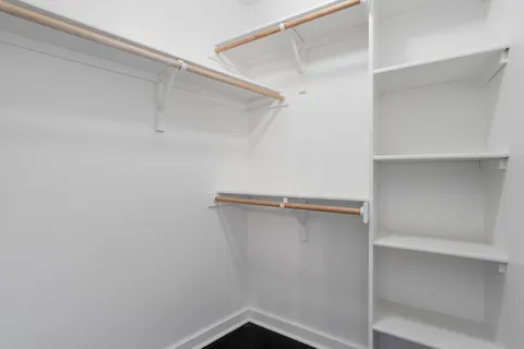 a view of an empty walk in closet
