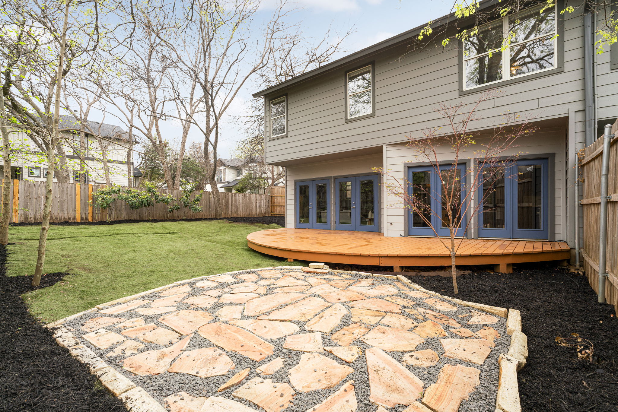 2114 Goodrich Avenue, Unit 10 Austin, TX 78704 - Photo 27 of 35 The private backyard creates a peaceful outdoor retreat under the trees rarely found in condo living.